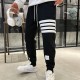 톰브라운 23FW 사선완장 트레이닝 팬츠 2칼라 MJQ008H 00535